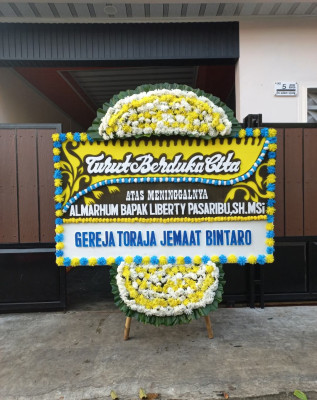 Papan Bunga Duka di Sorawolio